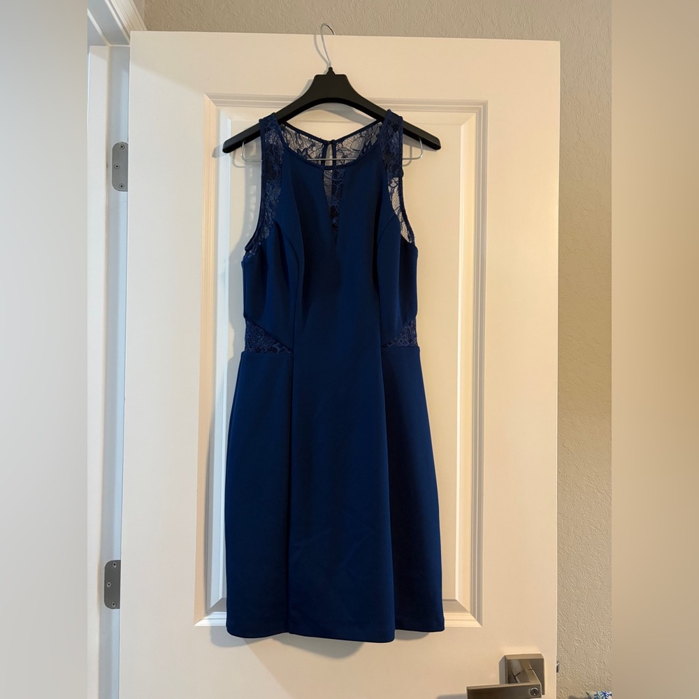 Guess ladies size 4 lined dress. Royal blue with lace at the top, sides.